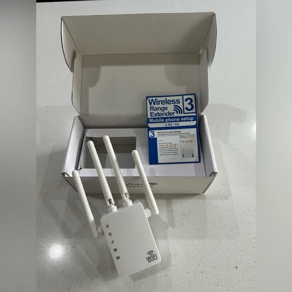 WiFi Extender, new in box never used. Bought two and only needed one. - Picture 1 of 7